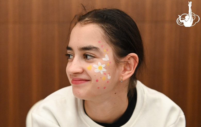 Academy student Anna Vakulenko in the face painting area