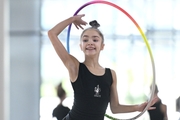 Ksenia Savinova during an exercise with a hoop during training at the Academy