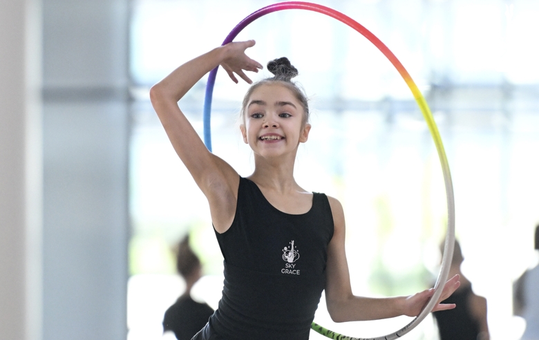 Ksenia Savinova during an exercise with a hoop during training at the Academy