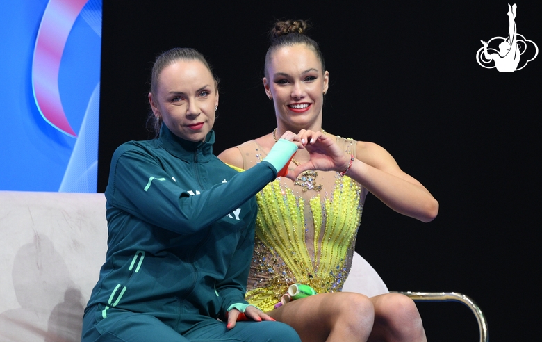 Hannah Panna Wiesner with a trainer after an exercise with clubs