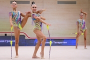 Gymnasts during an exercise with clubs