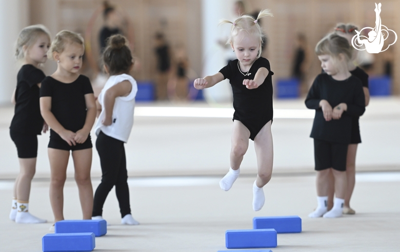 Young gymnasts during training