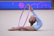 Young gymnast during an exercise with a hoop at the mAlinka tournament