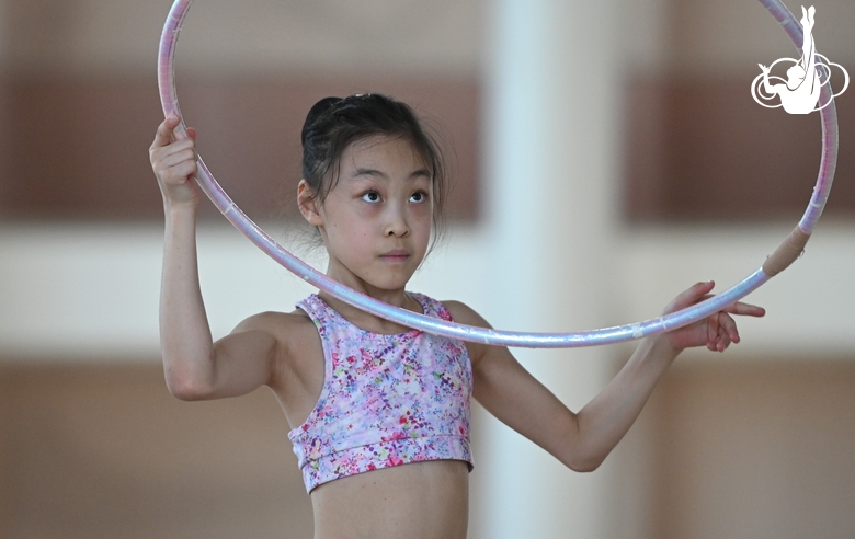 A gymnast from China during the hoop exercise when training