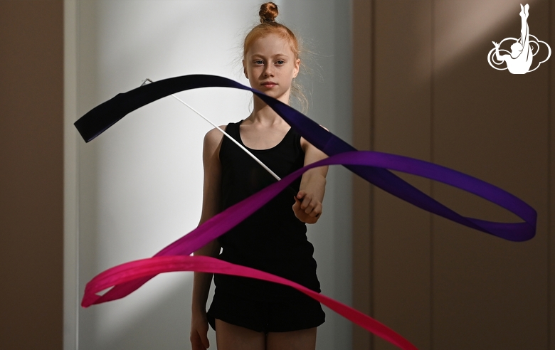 Olga Chernykh during an exercise with a ribbon