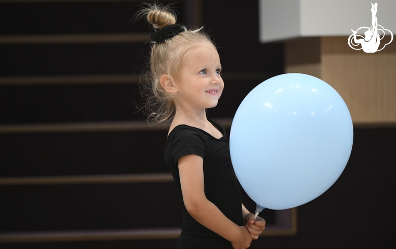 Young gymnast during training