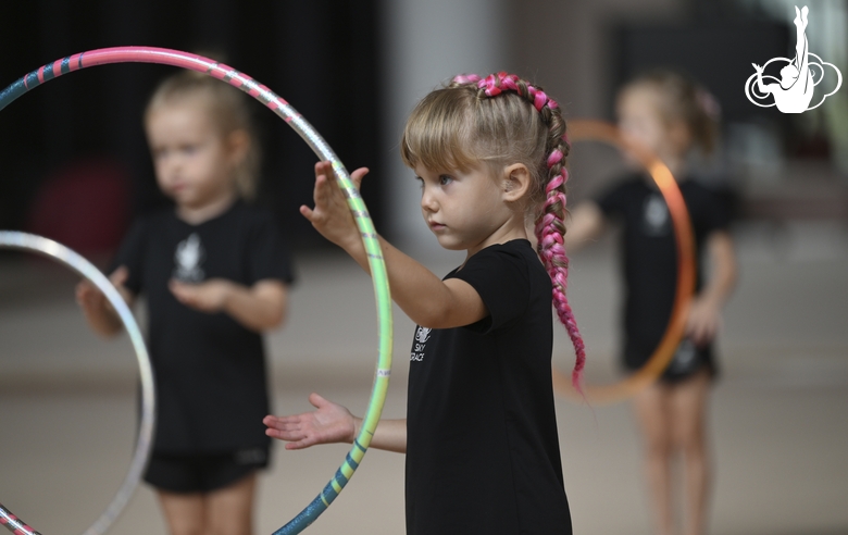 Young gymnasts during training