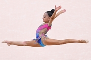 Gymnast performs a split jump during the Way to Victory tournament