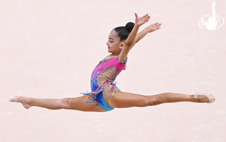 Gymnast performs a split jump during the Way to Victory tournament