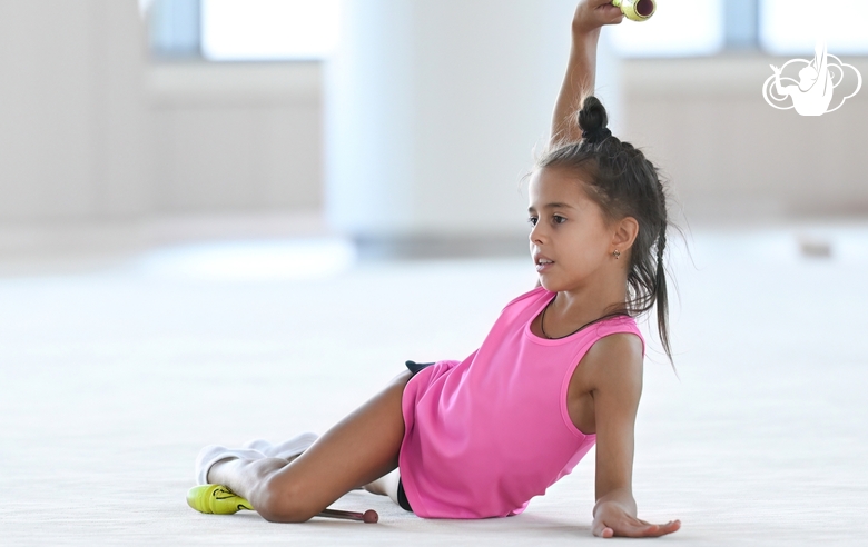 Sabina Samatova during an exercise with clubs