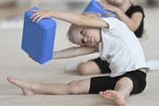 Young gymnasts during training