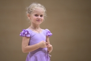 Young gymnast during training