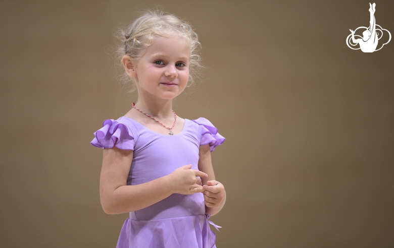 Young gymnast during training