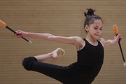 Valeria Medvedeva during an exercise with clubs