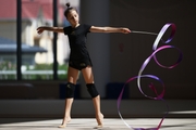 Gymnast during exercise with ribbon