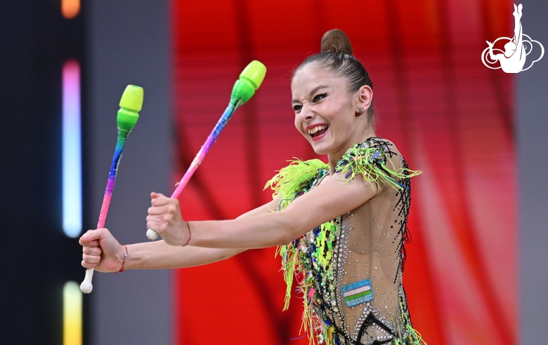 Yasmina Alimardonova during the exercise with clubs