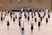 Young gymnasts during rehearsal of the competition opening