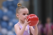 Young gymnast during an exercise with a ball at the mAlinka tournament