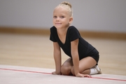 Young gymnast during training