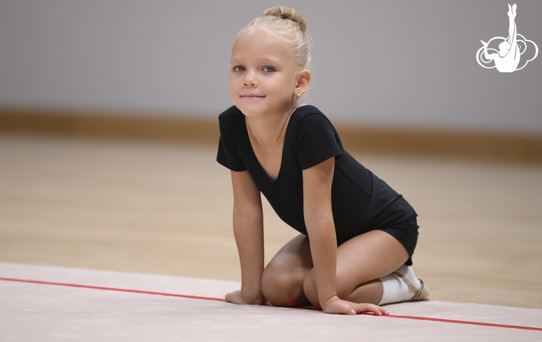 Young gymnast during training