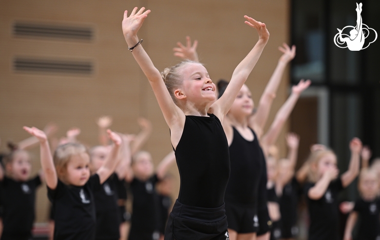 Young gymnasts during rehearsal of the competition opening