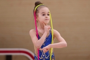 Young gymnast during the workout