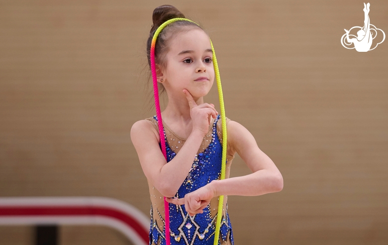 Young gymnast during the workout