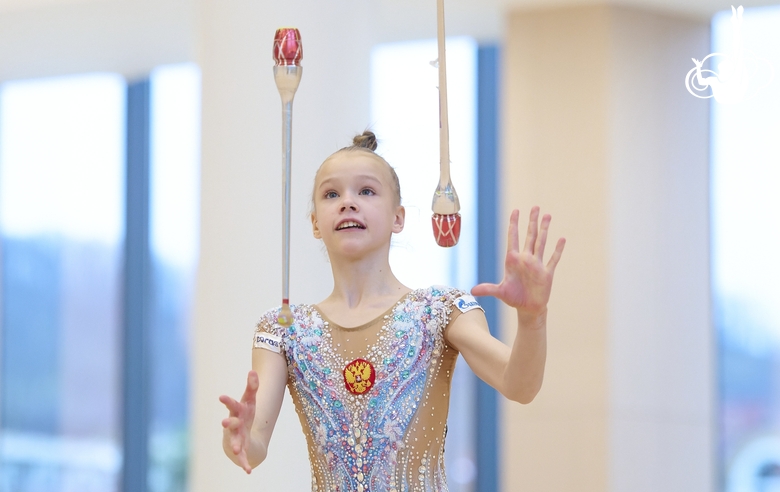 Kristina Voitenko during an exercise with clubs at a control training session