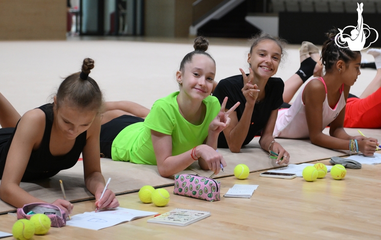 Gymnasts during a session with a psychologist at the training camp in the Academy