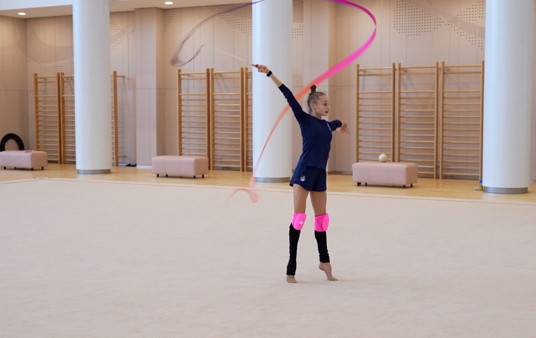 In a class with Olympic champion and coaches Evgeniya Eliseeva and Olga Minigalina, Yana Zaikina practiced her ribbon skills before the European Championship