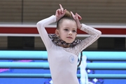 Young gymnast during an exercise with a jump rope at the mAlinka tournament