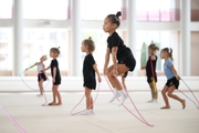 Young gymnasts during training