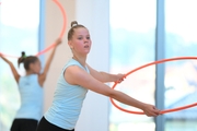 Gymnasts from the Khanty-Mansiysk Autonomous Okrug during an exercise with hoops