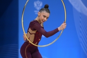 Arina Kovshova during an exercise with a hoop
