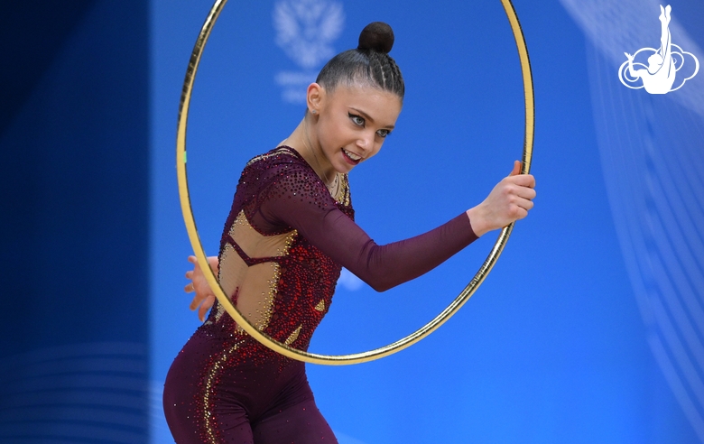 Arina Kovshova during an exercise with a hoop