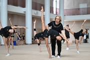 Coach Natalya Shmakova and a gymnast during the workout