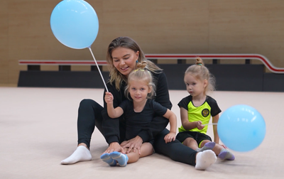 Alina Kabaeva is checking details of young girls during the selection to Academy’s free early development groups