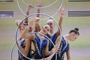 Gymnasts during an exercise with hoops