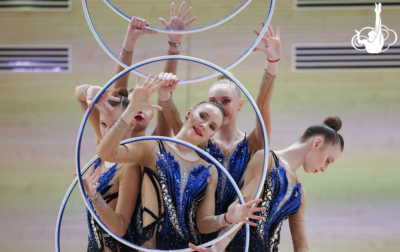 Gymnasts during an exercise with hoops