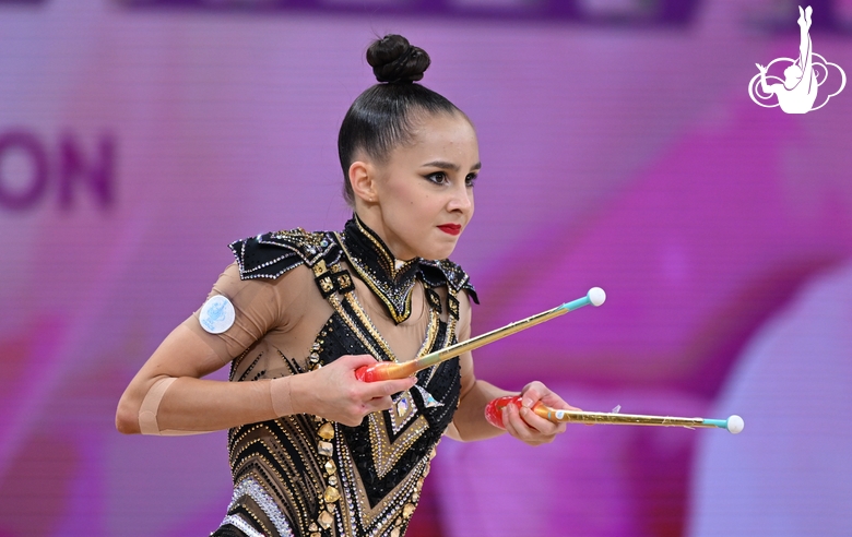 Mariia Borisovad uring an exercise with clubs