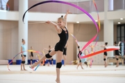 Kristina Voitenko during an exercise with a ribbon