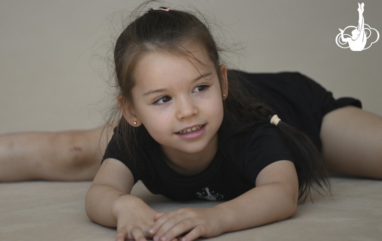 Young gymnast during training