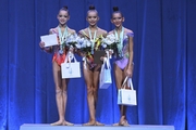 Uliana Ianus, Anastasia Vlasenko and Nikole Rimarachin Diaz at the awards ceremony