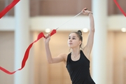 Mariia Borisova  during an exercise with a ribbon during training at the Academy