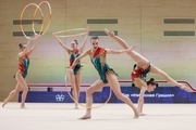 Gymnasts during an exercise with hoops