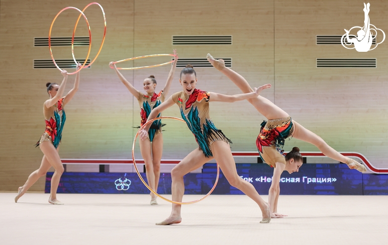 Gymnasts during an exercise with hoops