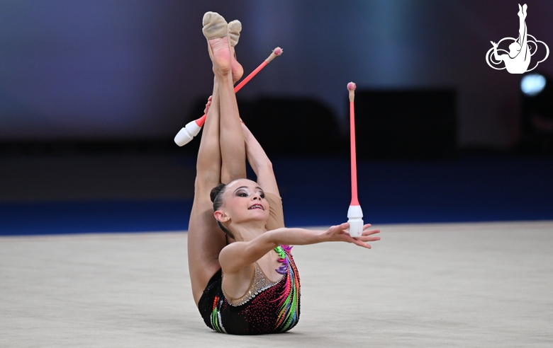Alesya Naifonova during the exercise with clubs