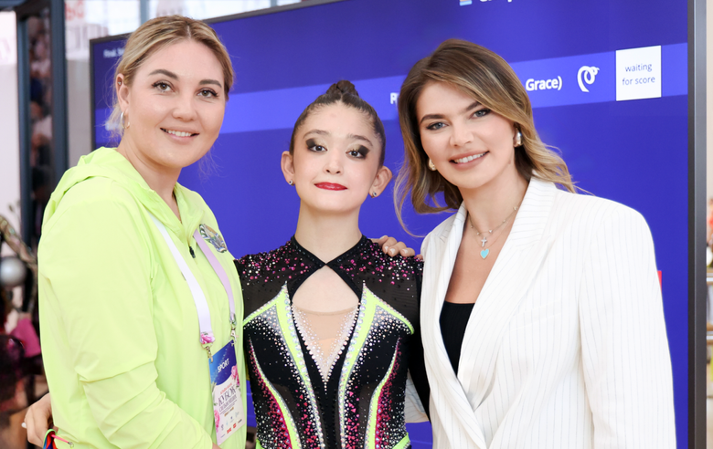 June 19, 2025. Olympic champion Alina Kabaeva with gymnast Lola Djuraeva and coach Inara Sattarova at a stage of the Cup of the Strongest at the Academy