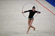 Aiganym Rysbek during the hoop exercise