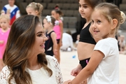 Olympic champion Alina Kabaeva with a young participant of the Academy selection process